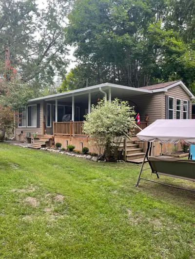 Northlander Reflection 12’ x 36’ model in excellent condition on a great lot with a perfect mix of s...