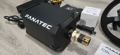 Fanatec DD1 wheelbase with steering wheel and accessories, View more