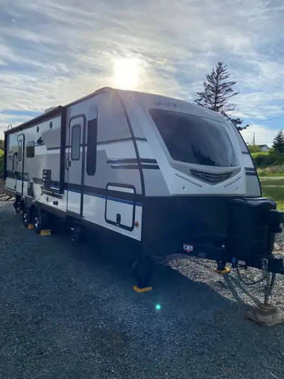Purchased new in June 2020, this is a very functional and ultra light travel trailer. With its cool...