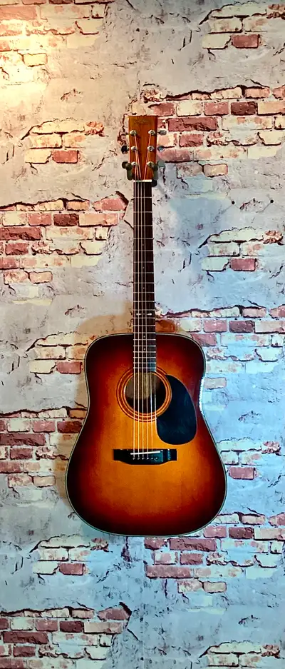 Early 1980's Sigma by Martin acoustic guitar in fantastic condition. Likely made in Korea the guitar...