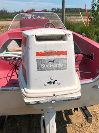 14 foot boat w/trailer and 20hp motor