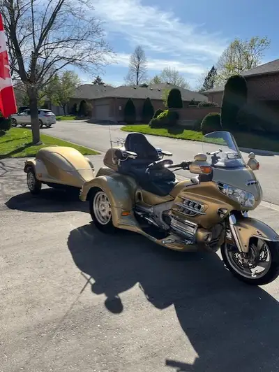 Nice Trike With 134000 Km In great shape as i baby it, Comes with travel trailer. I just turned 75 &...