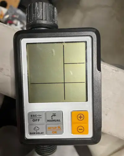 Digital Programmable Sprinkler water Timer, Irrigation System, Garden Hose Located outside of Edmont...