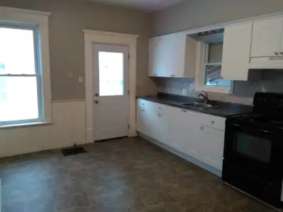 Main Floor 2 Bedroom Apartment in Adult Triplex