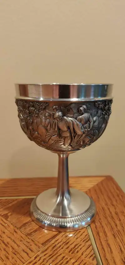 Experience the elegance and quality craftsmanship of bygone eras with this N K Fein Zinn Pewter Wine...