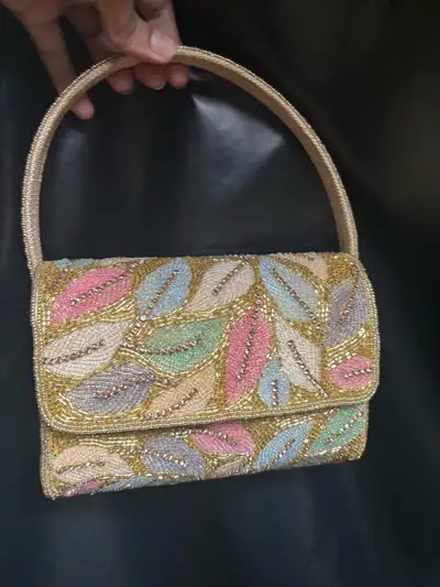 Multi colored beaded bag, View more