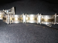 Silver and gold bracelet hand made with signature