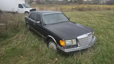 Mercedes-Benz 560 SEL Commanding presence with its sleek black exterior, this classic Mercedes is pa...