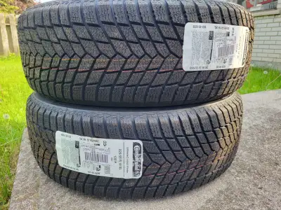 A Pair of Ultimate Contact winter tires, never mounted