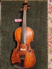 Antique fiddles restored for fiddlers