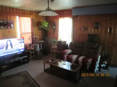 AVAILABLE JUNE 15 th. Unfurnished Large room for rent with a Senior couple. All dishes, Etc are incl...