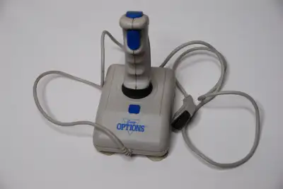 An older joystick with MIDI port connection - for dos/win 9x/win 2000(worked on it most recently). G...