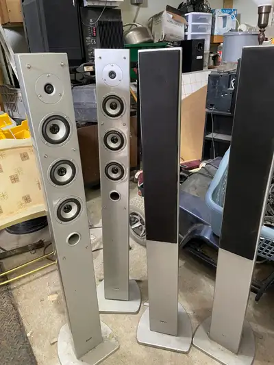 stereo speakers(QUEST) four of them about 4 ft high, View more