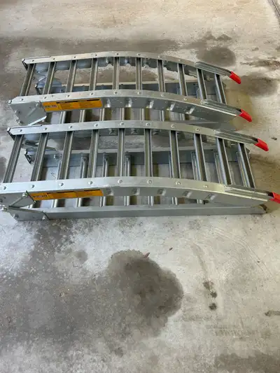 Aluminum ATV ramps. Used a handful of times. Approx 8ft extended.