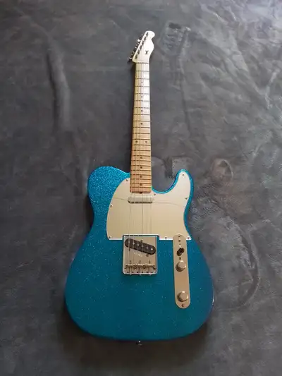 For sale: Fender J Mascis Telecaster in Bottle Rocket Blue Flake. Alder body, maple neck, maple fing...