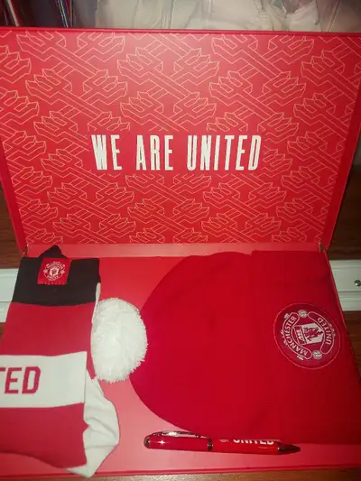 35$ for all. 2 Toques, a scarf, pair of socks, pen all from Manchester United official membership pa...