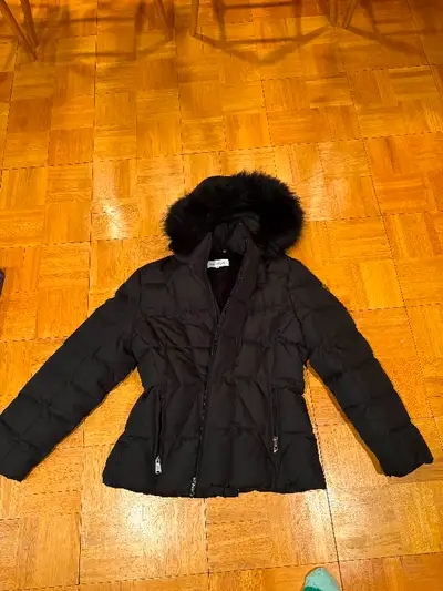 Brand new, never worn black Calvin Klein XL women’s winter jacket. Down and feather. Style: CWH19755...