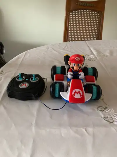 Nintendo Super Mario Kart with remote. This is in anti gravity car that can switch between standard...