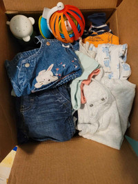 Box of baby clothes 