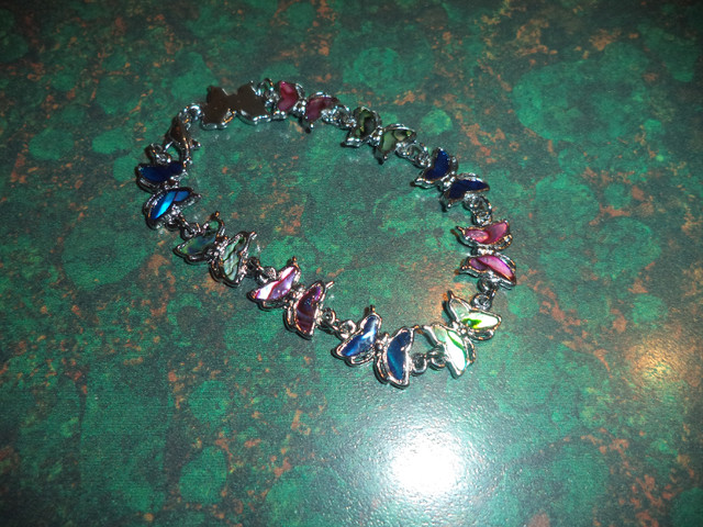 SILVER BRACLET WITH BUTTERFLIES in Jewellery & Watches in Stratford