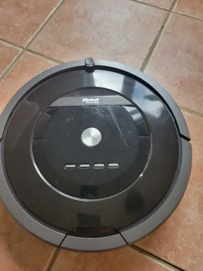 I'm selling a used iRobot Roomba vacuum cleaner with the virtual wall lighthouses. This Roomba is de...