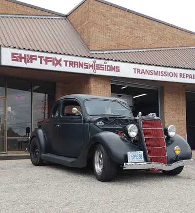 Feast your eyes on this striking 1935 Ford Coupe Hot Rod, a true testament to classic automotive cra...