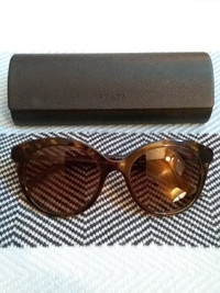 Prada and Ray Ban sunglasses