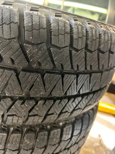 Set of 4 Winter Bridgestone Blizzak WS90 205/55/16 Very low kms Lots of tread Tread depth 11/32nd Pr...