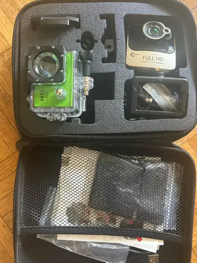 HD GoPro camera with bonus HDdash camera Comes with hard shell case Used once during a vacation trip...