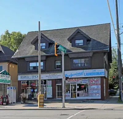 Three-storey mixed-use building featuring two retail units on the main floor (1,500 sq. ft. each) an...