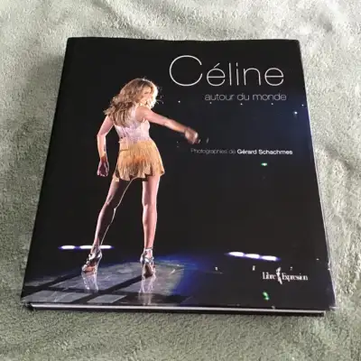 Très beau livre de Céline Dion en tournée, en très bon état Demande $30….laisse à. $20