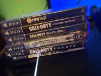 PS4 games and two controllers 