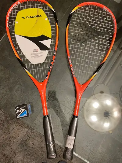 2 brand new Diadora rackets for Juniors. $25 each, $50 (FIRM) with free new DUNLOP blue dot squash b...