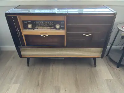 Vintage stereo console with turntable, View more