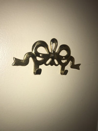 Vintage solid brass bow ribbon hanger