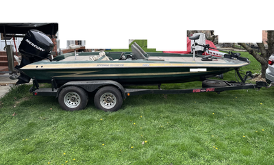Tandem Axle trailer included features a spare tire carrier, surge brakes Ready to fish, turnkey read...