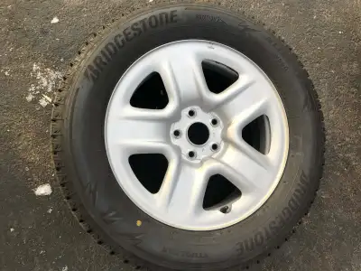 Selling four 235/60R17 Bridgestone Blizzak WS90 winter tires on Toyota factory hub-centric rims 5x11...