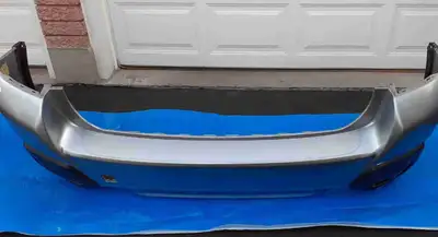 This is a used 2018 Subaru Crosstrek rear bumper in silver, ready to give your vehicle a fresh look!...