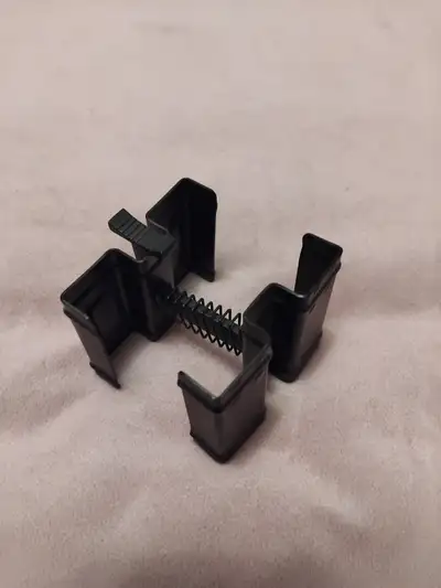 Metal M4 double magazine coupler., View more