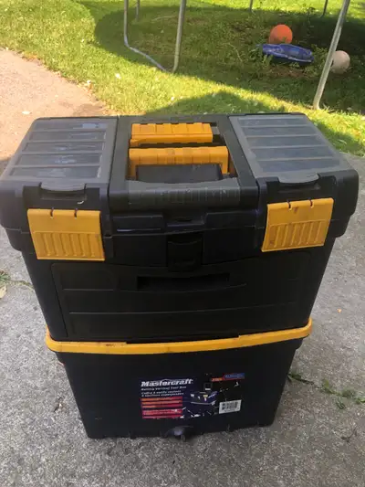 This is a Mastercraft tool box with a rolling bottom. It is in used condition, with some signs of we...