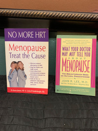 Variety of books holy bible, menopause, his/hers love book