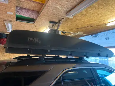 I'm selling a used Thule Adventurer cargo box, perfect for adding extra storage to your vehicle. It'...