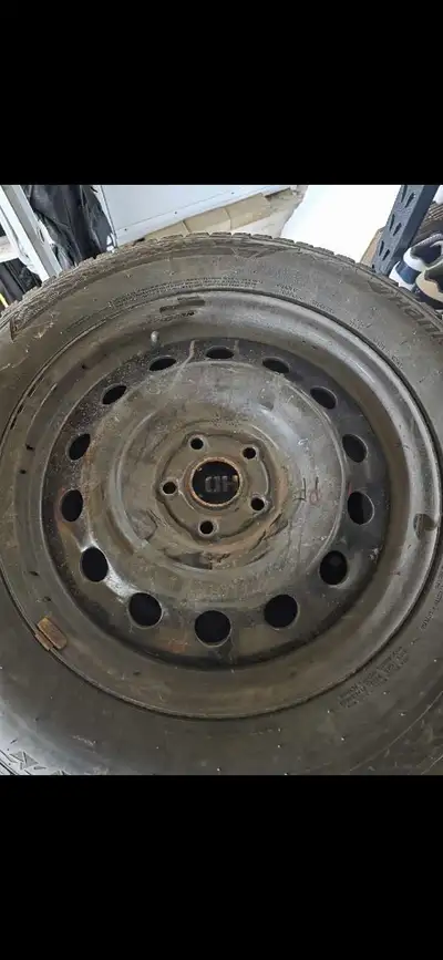 Lightly used Hankook winter tires on black steel rims. These 215/65R17 studless radial tires were on...