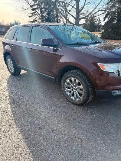 Leather seats, power drivers seat, power rear hatch.