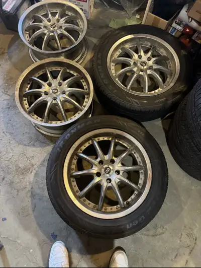 18 inch enkei rims 5x114.3 bolt pattern. 2 of them have 235/55 r18 tires with decent tread. Offset +...