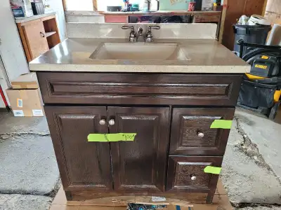 22 inches wide, 40 inches tall top of back splash, 37 inches long