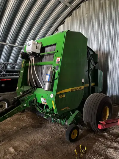 Has 23000 bales, net and twine, mega wide pickup. Does not come with granular applicator. 306-383-77...
