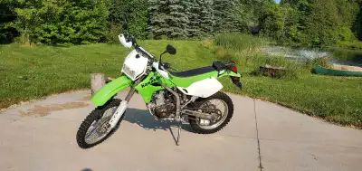 2006 Kawasaki KLX250S dual purpose bike, used 98% on the road. 28K km. Runs great, lots of new parts...