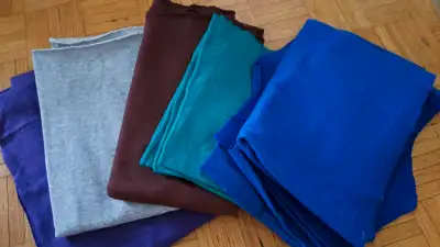 Fleece fabric cuttings and panels Some kind of polyester fleece that my grandmother must have bought...