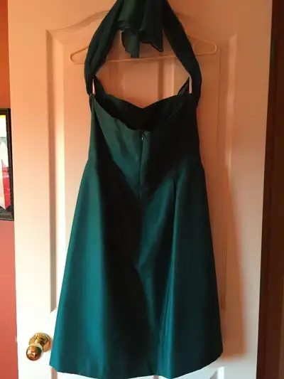 Beautiful silk emerald green LynnLugo knee length dress.Worn once as a bridesmaid dress.Would also b...